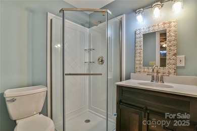 A Sunlit Corner Retreat in The Lynx - Wrapped in Woods, Light on Black Mountain Golf Course in North Carolina - for sale on GolfHomes.com, golf home, golf lot