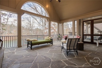 Lakefront retreat - 127 ft waterfront - Max dock with lift - on Reynolds Lake Oconee - The Oconee in Georgia - for sale on GolfHomes.com, golf home, golf lot