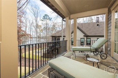 Lakefront retreat - 127 ft waterfront - Max dock with lift - on Reynolds Lake Oconee - The Oconee in Georgia - for sale on GolfHomes.com, golf home, golf lot