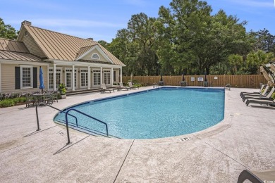 This beautifully maintained, all brick, 3-bedroom, 2-bath home on Willbrook Plantation in South Carolina - for sale on GolfHomes.com, golf home, golf lot