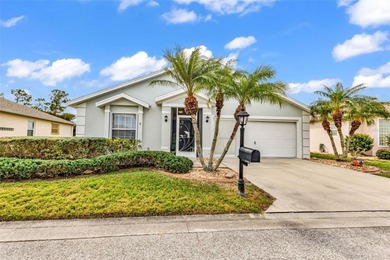 NICELY UPDATED and VERY WELL MAINTAINED Sheffield model with on Kings Gate Golf Club in Florida - for sale on GolfHomes.com, golf home, golf lot
