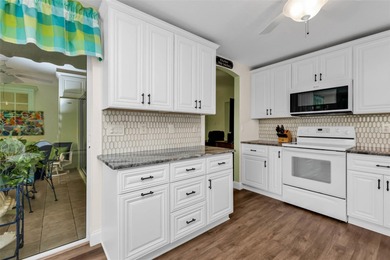 NICELY UPDATED and VERY WELL MAINTAINED Sheffield model with on Kings Gate Golf Club in Florida - for sale on GolfHomes.com, golf home, golf lot