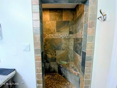 Experience comfortable living in this spacious all-brick home on Beaver Brook Golf and Country Club in Tennessee - for sale on GolfHomes.com, golf home, golf lot