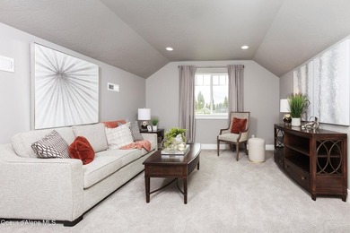 The Kingston has a large chef's kitchen with island, a spacious on Prairie Falls Golf Club in Idaho - for sale on GolfHomes.com, golf home, golf lot