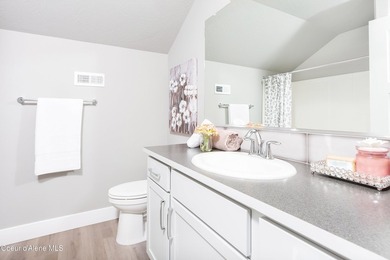 The Kingston has a large chef's kitchen with island, a spacious on Prairie Falls Golf Club in Idaho - for sale on GolfHomes.com, golf home, golf lot