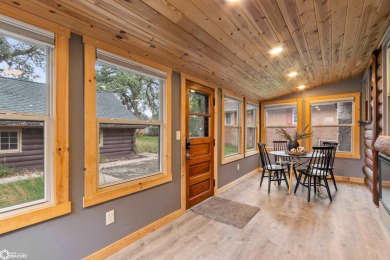 This charming cabin-style family home has been completely redone on All Vets Golf Club in Iowa - for sale on GolfHomes.com, golf home, golf lot