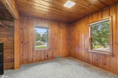 This charming cabin-style family home has been completely redone on All Vets Golf Club in Iowa - for sale on GolfHomes.com, golf home, golf lot