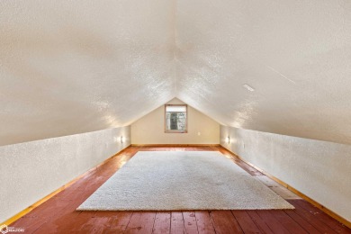 This charming cabin-style family home has been completely redone on All Vets Golf Club in Iowa - for sale on GolfHomes.com, golf home, golf lot