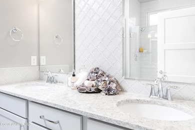 The Kingston has a large chef's kitchen with island, a spacious on Prairie Falls Golf Club in Idaho - for sale on GolfHomes.com, golf home, golf lot