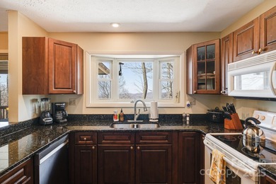 Within the picturesque mountains of Western North Carolina on Wolf Laurel Country Club in North Carolina - for sale on GolfHomes.com, golf home, golf lot