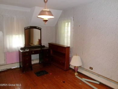 This is a Unique home on a very private 2.5 acre lot offering on Hoosick Falls Country Club in New York - for sale on GolfHomes.com, golf home, golf lot