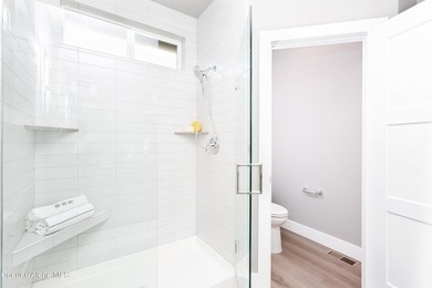 The Kingston has a large chef's kitchen with island, a spacious on Prairie Falls Golf Club in Idaho - for sale on GolfHomes.com, golf home, golf lot