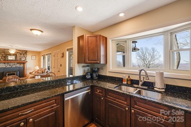 Within the picturesque mountains of Western North Carolina on Wolf Laurel Country Club in North Carolina - for sale on GolfHomes.com, golf home, golf lot