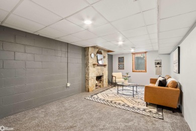 This charming cabin-style family home has been completely redone on All Vets Golf Club in Iowa - for sale on GolfHomes.com, golf home, golf lot