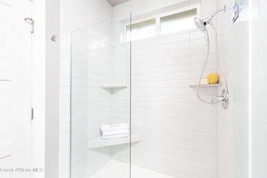 The Kingston has a large chef's kitchen with island, a spacious on Prairie Falls Golf Club in Idaho - for sale on GolfHomes.com, golf home, golf lot