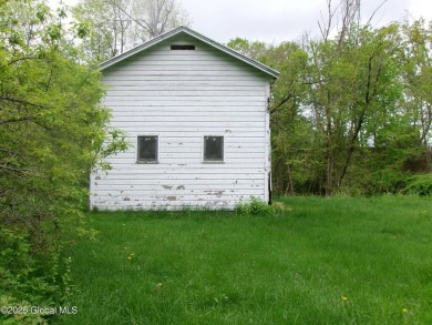 This is a Unique home on a very private 2.5 acre lot offering on Hoosick Falls Country Club in New York - for sale on GolfHomes.com, golf home, golf lot