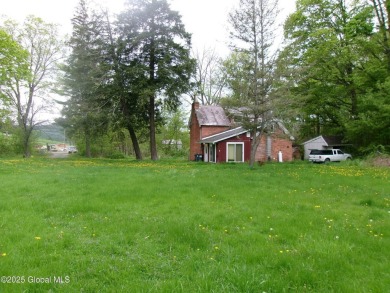This is a Unique home on a very private 2.5 acre lot offering on Hoosick Falls Country Club in New York - for sale on GolfHomes.com, golf home, golf lot