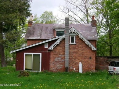 This is a Unique home on a very private 2.5 acre lot offering on Hoosick Falls Country Club in New York - for sale on GolfHomes.com, golf home, golf lot