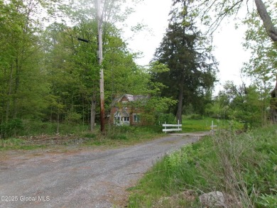 This is a Unique home on a very private 2.5 acre lot offering on Hoosick Falls Country Club in New York - for sale on GolfHomes.com, golf home, golf lot