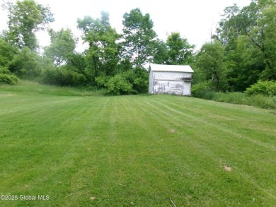 This is a Unique home on a very private 2.5 acre lot offering on Hoosick Falls Country Club in New York - for sale on GolfHomes.com, golf home, golf lot