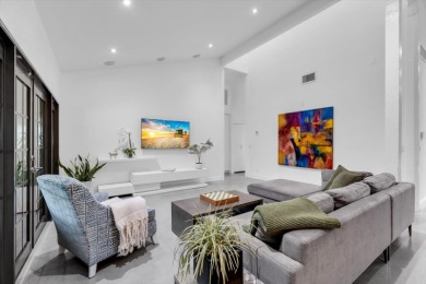 Bright and inviting, this 3-bedroom, 3-bath bungalow offers on Palm Beach Polo and Country Club in Florida - for sale on GolfHomes.com, golf home, golf lot
