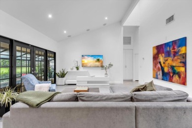 Bright and inviting, this 3-bedroom, 3-bath bungalow offers on Palm Beach Polo and Country Club in Florida - for sale on GolfHomes.com, golf home, golf lot