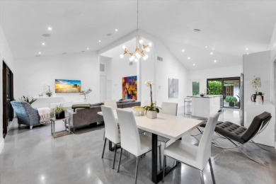 Bright and inviting, this 3-bedroom, 3-bath bungalow offers on Palm Beach Polo and Country Club in Florida - for sale on GolfHomes.com, golf home, golf lot