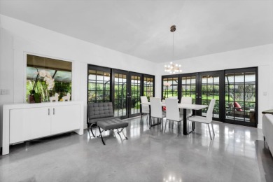 Bright and inviting, this 3-bedroom, 3-bath bungalow offers on Palm Beach Polo and Country Club in Florida - for sale on GolfHomes.com, golf home, golf lot