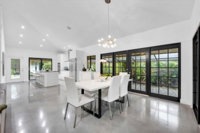 Bright and inviting, this 3-bedroom, 3-bath bungalow offers on Palm Beach Polo and Country Club in Florida - for sale on GolfHomes.com, golf home, golf lot