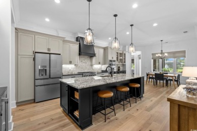 Experience refined living in this immaculate custom estate on Grande Dunes Golf Club in South Carolina - for sale on GolfHomes.com, golf home, golf lot