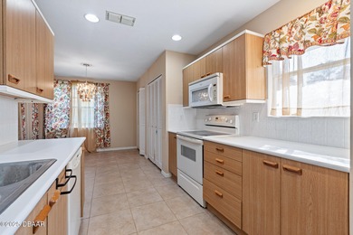 Discover the potential of this perfect fixer-upper located in on Plantation Bay Golf and Country Club in Florida - for sale on GolfHomes.com, golf home, golf lot