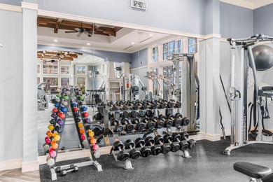 Tucked within the private gates of Wild Heron, 1203 W Water Oak on Sharks Tooth Golf Club in Florida - for sale on GolfHomes.com, golf home, golf lot