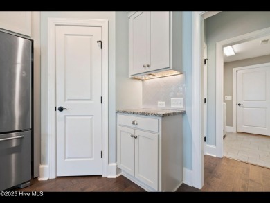 Welcome to this beautifully crafted home in the gated community on Compass Pointe Golf Course in North Carolina - for sale on GolfHomes.com, golf home, golf lot