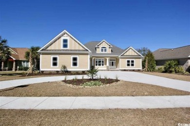 This brand-new custom home boasts 5 spacious bedrooms and 4 on Wild Wing Plantation in South Carolina - for sale on GolfHomes.com, golf home, golf lot