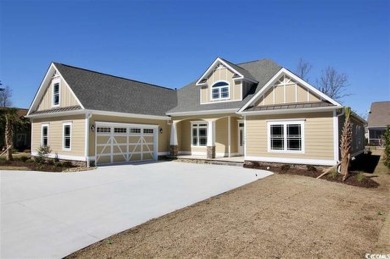 This brand-new custom home boasts 5 spacious bedrooms and 4 on Wild Wing Plantation in South Carolina - for sale on GolfHomes.com, golf home, golf lot