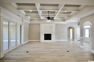 This brand-new custom home boasts 5 spacious bedrooms and 4 on Wild Wing Plantation in South Carolina - for sale on GolfHomes.com, golf home, golf lot