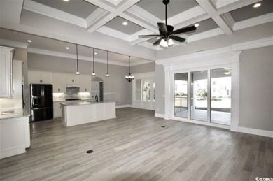 This brand-new custom home boasts 5 spacious bedrooms and 4 on Wild Wing Plantation in South Carolina - for sale on GolfHomes.com, golf home, golf lot