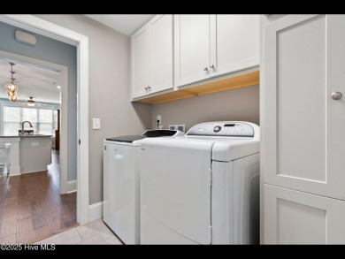Welcome to this beautifully crafted home in the gated community on Compass Pointe Golf Course in North Carolina - for sale on GolfHomes.com, golf home, golf lot