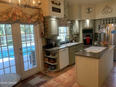 WOW! Rare offering. This 3/2.5 Pool home sits on a half acre on on The Club At Pelican Bay - North Course in Florida - for sale on GolfHomes.com, golf home, golf lot