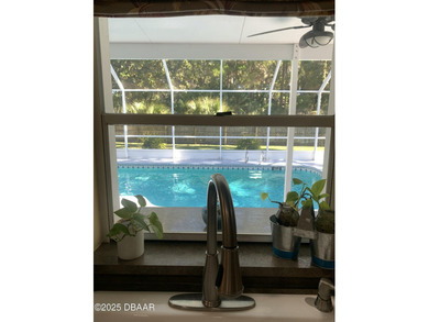 WOW! Rare offering. This 3/2.5 Pool home sits on a half acre on on The Club At Pelican Bay - North Course in Florida - for sale on GolfHomes.com, golf home, golf lot