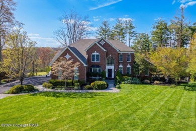 Discover the pinnacle of luxury in the Pocono Mountains of on Great Bear Golf and Country Club in Pennsylvania - for sale on GolfHomes.com, golf home, golf lot