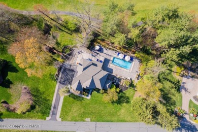 Discover the pinnacle of luxury in the Pocono Mountains of on Great Bear Golf and Country Club in Pennsylvania - for sale on GolfHomes.com, golf home, golf lot