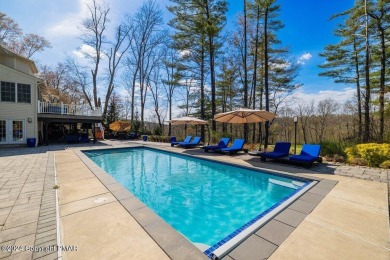 Discover the pinnacle of luxury in the Pocono Mountains of on Great Bear Golf and Country Club in Pennsylvania - for sale on GolfHomes.com, golf home, golf lot