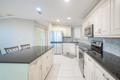 PUNTA GORDA, FL - Welcome to easy, carefree Florida living in on Saint Andrews South Golf Club in Florida - for sale on GolfHomes.com, golf home, golf lot