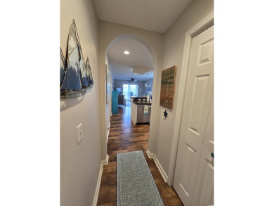 This fully furnished turnkey condo in the Spinnaker Cove section on The Valley At Eastport in South Carolina - for sale on GolfHomes.com, golf home, golf lot