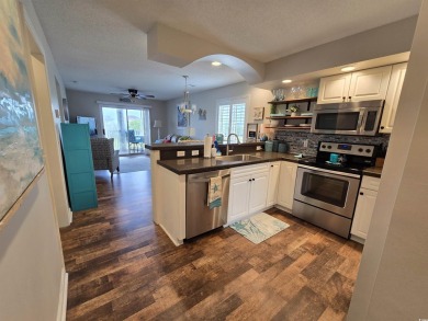This fully furnished turnkey condo in the Spinnaker Cove section on The Valley At Eastport in South Carolina - for sale on GolfHomes.com, golf home, golf lot