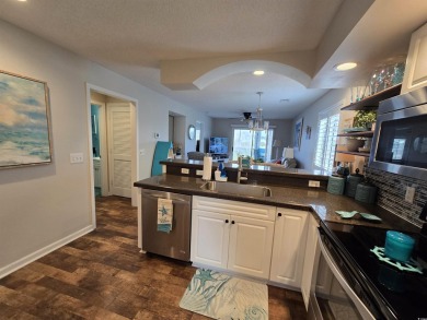 This fully furnished turnkey condo in the Spinnaker Cove section on The Valley At Eastport in South Carolina - for sale on GolfHomes.com, golf home, golf lot