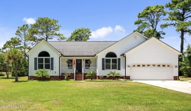 Welcome to this beautiful 3-bedroom, 2-bath home nestled in the on Harbour Point Golf Club in North Carolina - for sale on GolfHomes.com, golf home, golf lot