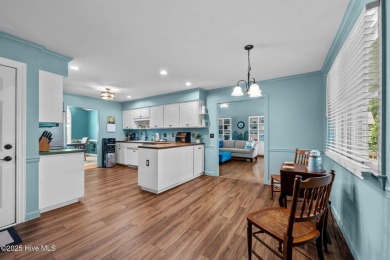 Welcome to this beautiful 3-bedroom, 2-bath home nestled in the on Harbour Point Golf Club in North Carolina - for sale on GolfHomes.com, golf home, golf lot