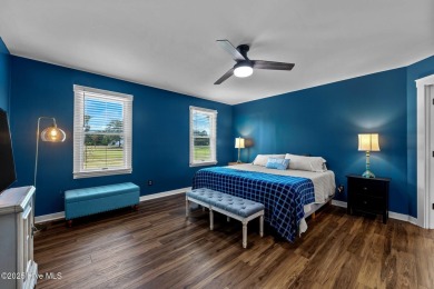 Welcome to this beautiful 3-bedroom, 2-bath home nestled in the on Harbour Point Golf Club in North Carolina - for sale on GolfHomes.com, golf home, golf lot
